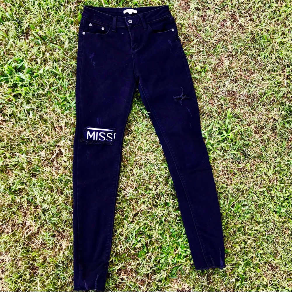 Destress black skinny jeans